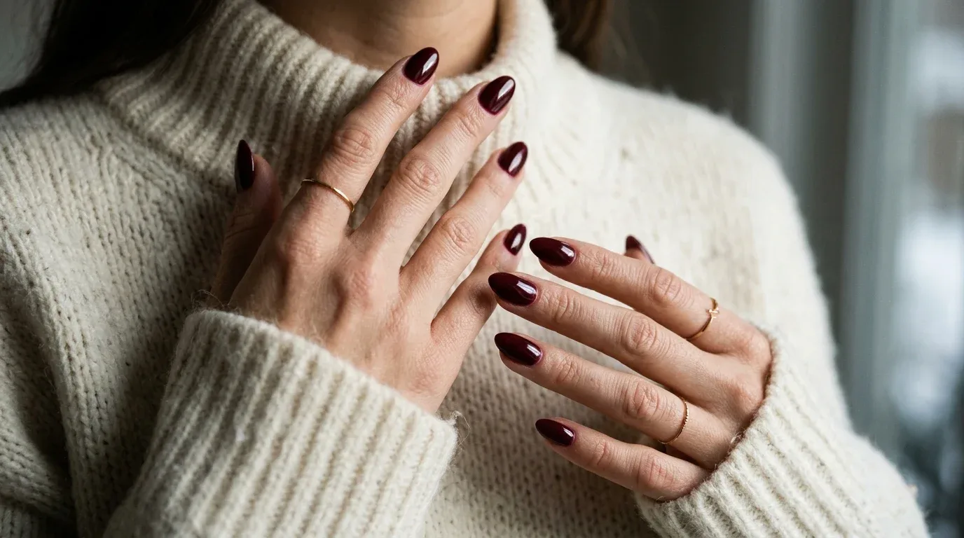 Deep burgundy winter Valentine's nails with a rich wine-red finish and elegant styling.