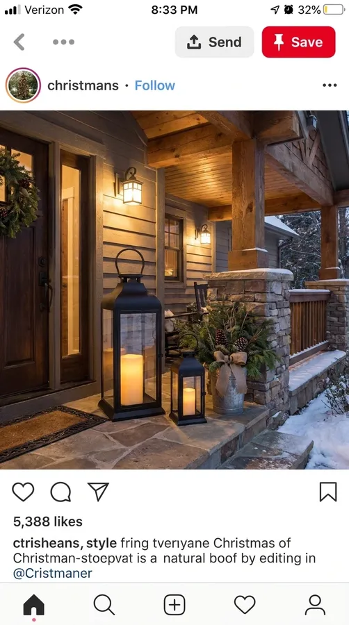 Oversized Christmas lantern with a glowing candle beside a festive and welcoming entryway.